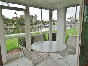 Dining - Waterfront 2BR, 2BA condo with heated pool, WiFi, and marina access. (Marco Island)