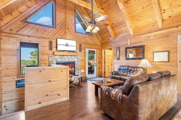 Téléviseur, foyer, table de baby-foot, chaîne audio