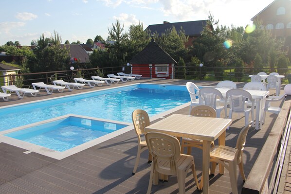 Seasonal outdoor pool, pool umbrellas, sun loungers