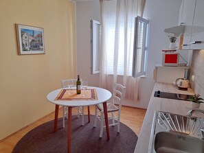 Fridge, microwave, cookware/dishes/utensils
