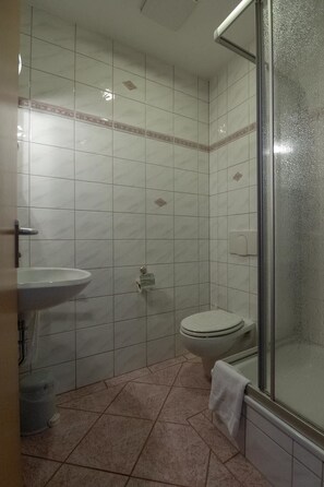 Shower, free toiletries, hair dryer, towels