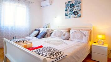 1 habitación, acceso a internet y ropa de cama