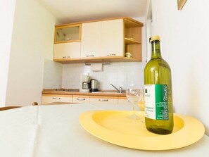 Fridge, microwave, cookware/dishes/utensils