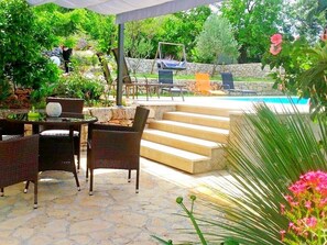 Outdoor dining - Holiday home Jadranka, (15269), Vinišće, hr (Vinišće)