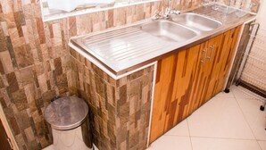 Family Apartment | Private kitchen | Fridge, microwave, oven, stovetop