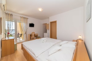 1 quarto, acesso à internet, roupa de cama