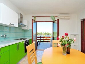 Fridge, microwave, cookware/dishes/utensils