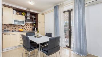 Fridge, microwave, toaster, cookware/dishes/utensils