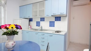 Fridge, microwave, cookware/dishes/utensils