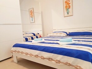 1 habitación, acceso a internet y ropa de cama 