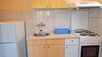 Fridge, microwave, cookware/dishes/utensils