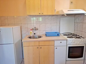 Fridge, microwave, cookware/dishes/utensils