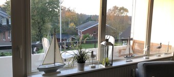 Beautiful, bright apartment with south / west balcony near the beach