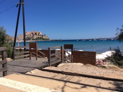Available 13 July/10August.Calvi center, large terrace, air cond,beach