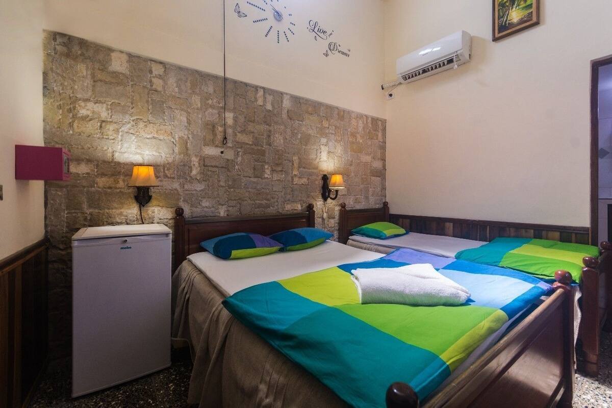 Family Double Room, Multiple Beds, Non Smoking, Courtyard View | Extra beds
