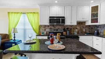 Coffee/tea maker, fridge, microwave, oven