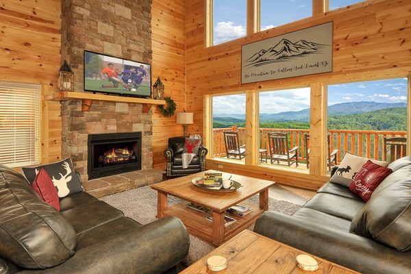 Enjoy the views and the 27' high stacked-stone gas fireplace w/wall of windows