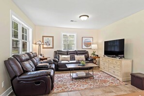 TV, DVD player, foosball, books