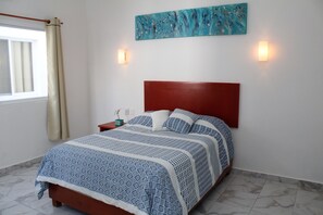 Standard Apartment, Multiple Beds, Non Smoking, Garden View | 4 bedrooms, down comforters, pillowtop beds, minibar