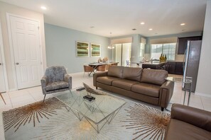 - Gather in this beautifully designed space with sleek furniture and thoughtful decor
- Open and inviting layout connects the living, dining, and kitchen areas effortlessly
- Bright and airy with modern touches, perfect for making memories together
