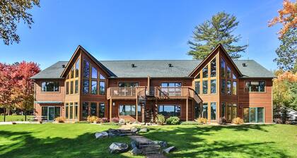 Modern Northwoods Condo on the Eagle River Chain of Lakes with a private dock!