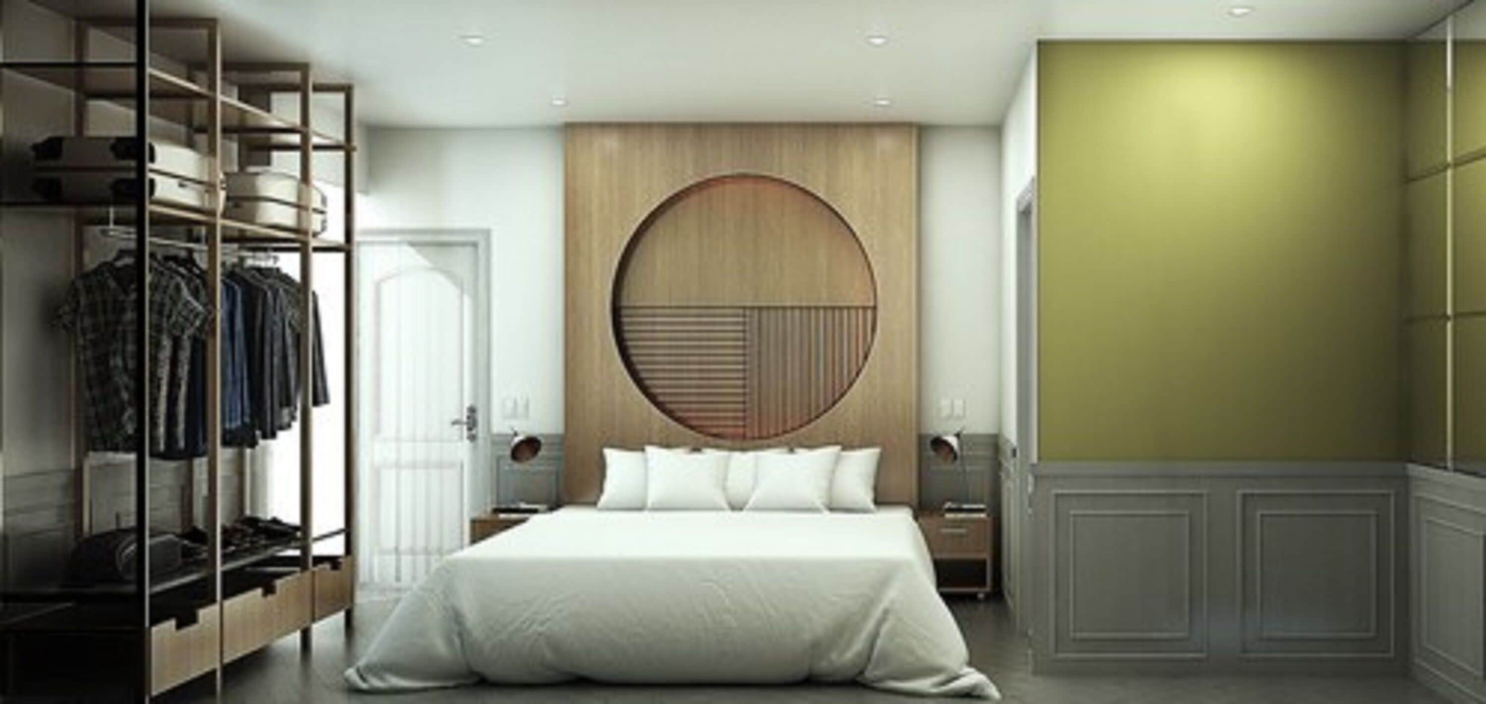 A modern bedroom with a large bed, a built-in wardrobe, and a circular wall feature.