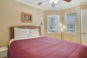 1 habitación, tabla de planchar con plancha y ropa de cama