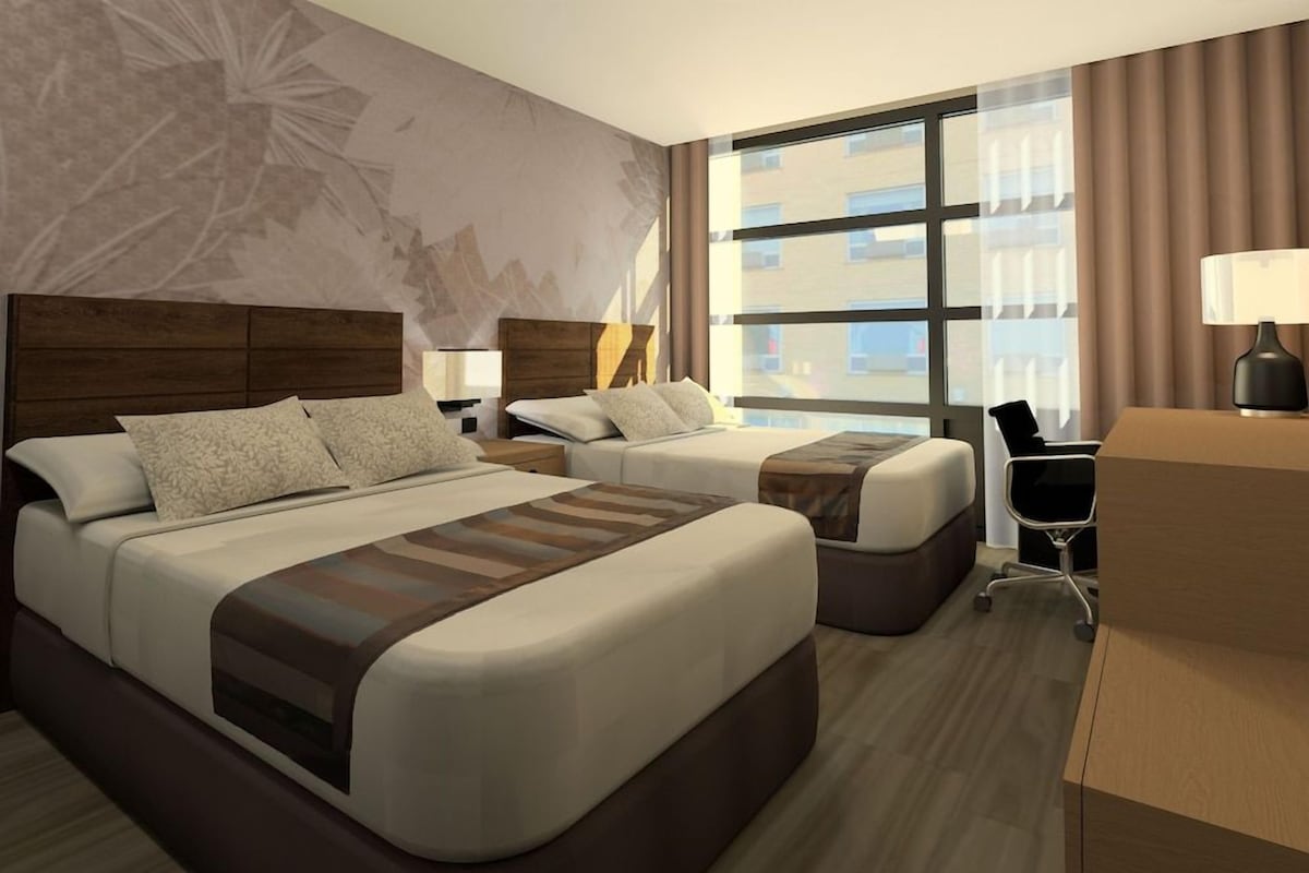 Hypo-allergenic bedding, in-room safe, desk, laptop workspace