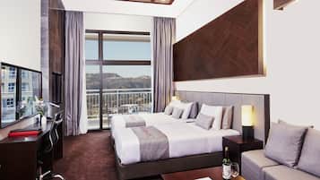 Suite, Multiple Beds, Non Smoking | Down comforters, in-room safe, desk, laptop workspace