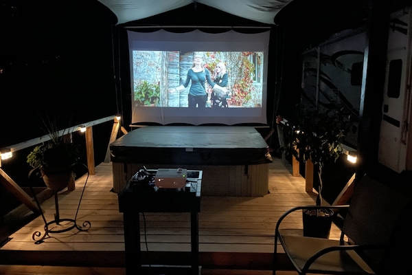 In the evenings relax with our new outdoor movie theater.