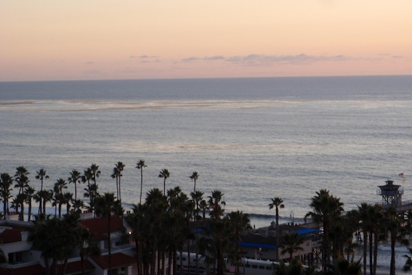 View from Surf Shack living room, dining room, balcony, kitchen, MBR pillow.