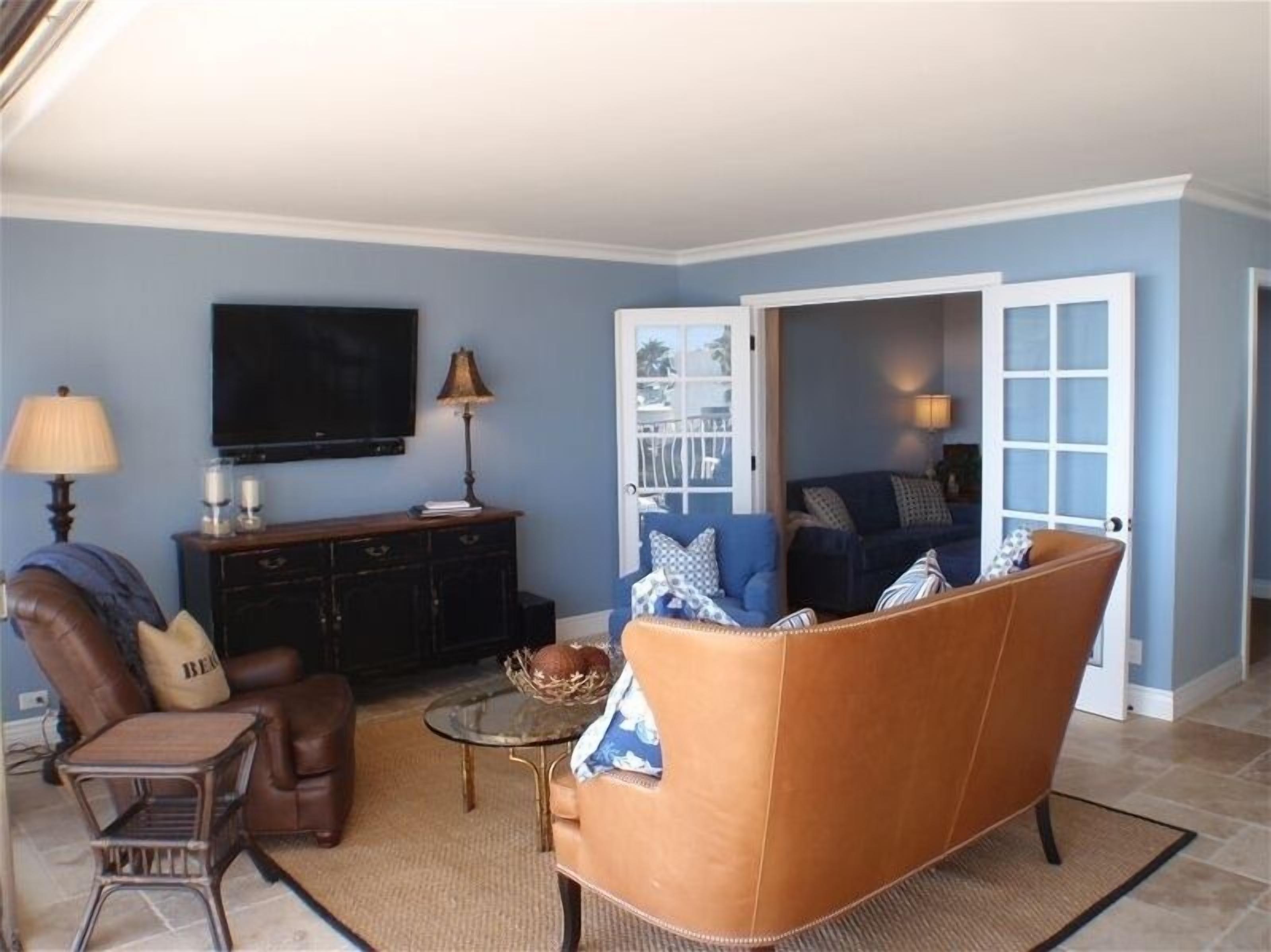 Flat-screen TV, video games, DVD player, books