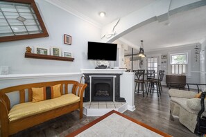 Smart TV, fireplace, DVD player, books