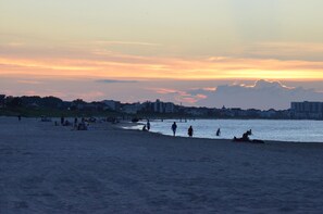 On the beach, sun-loungers, beach towels