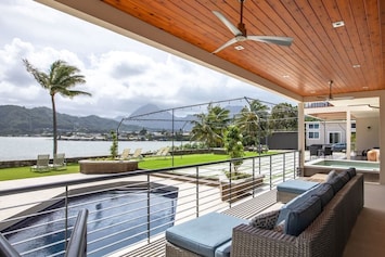 Welcome to Springer Estate! Relax in the pool, hot tub, or sit outside without missing any views of this gorgeous bay!