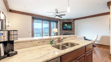 Dishwasher, coffee/tea maker, cookware/dishes/utensils