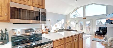 Dishwasher, coffee/tea maker, cookware/dishes/utensils, dining tables