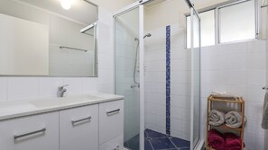 Shower, hair dryer, towels, soap