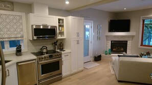 Fridge, microwave, oven, stovetop - Luxury Waterfront Retreat Right on the Ocean with Pool, Hot Tub and Private Dock (Port Moody)