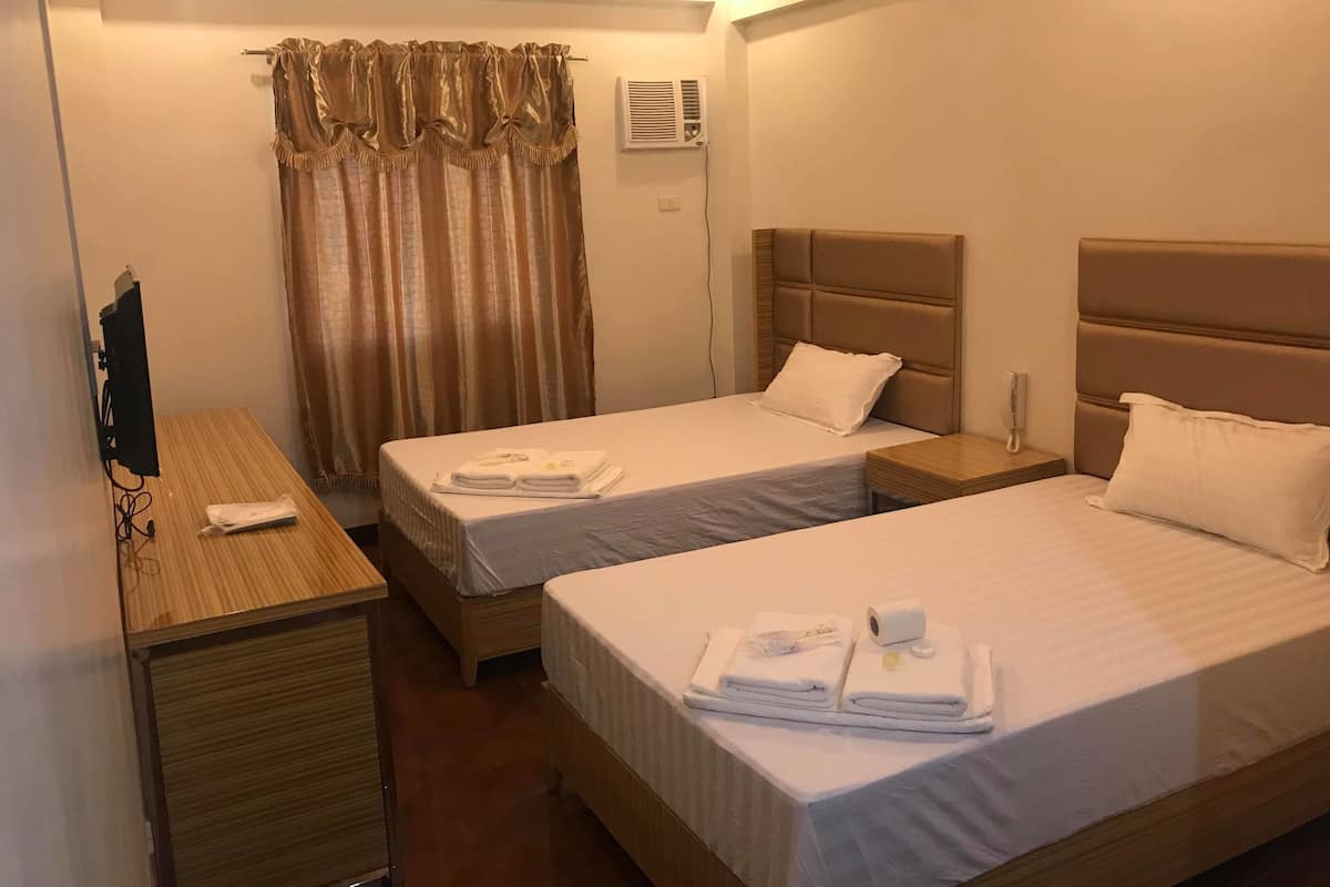 Deluxe Twin kamer | Een bureau, gratis wifi, beddengoed