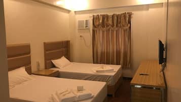 Habitación Deluxe con 2 camas individuales | Escritorio, wifi gratis y ropa de cama