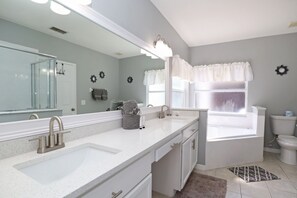 Combined shower/tub, hair dryer, towels, soap