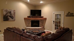 Smart TV, fireplace, DVD player, foosball