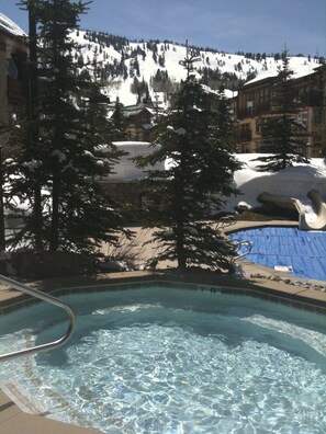 Outdoor pool, a heated pool - SKI IN/OUT Studio Condo with stunning Village & Slope views  (SOLITUDE)