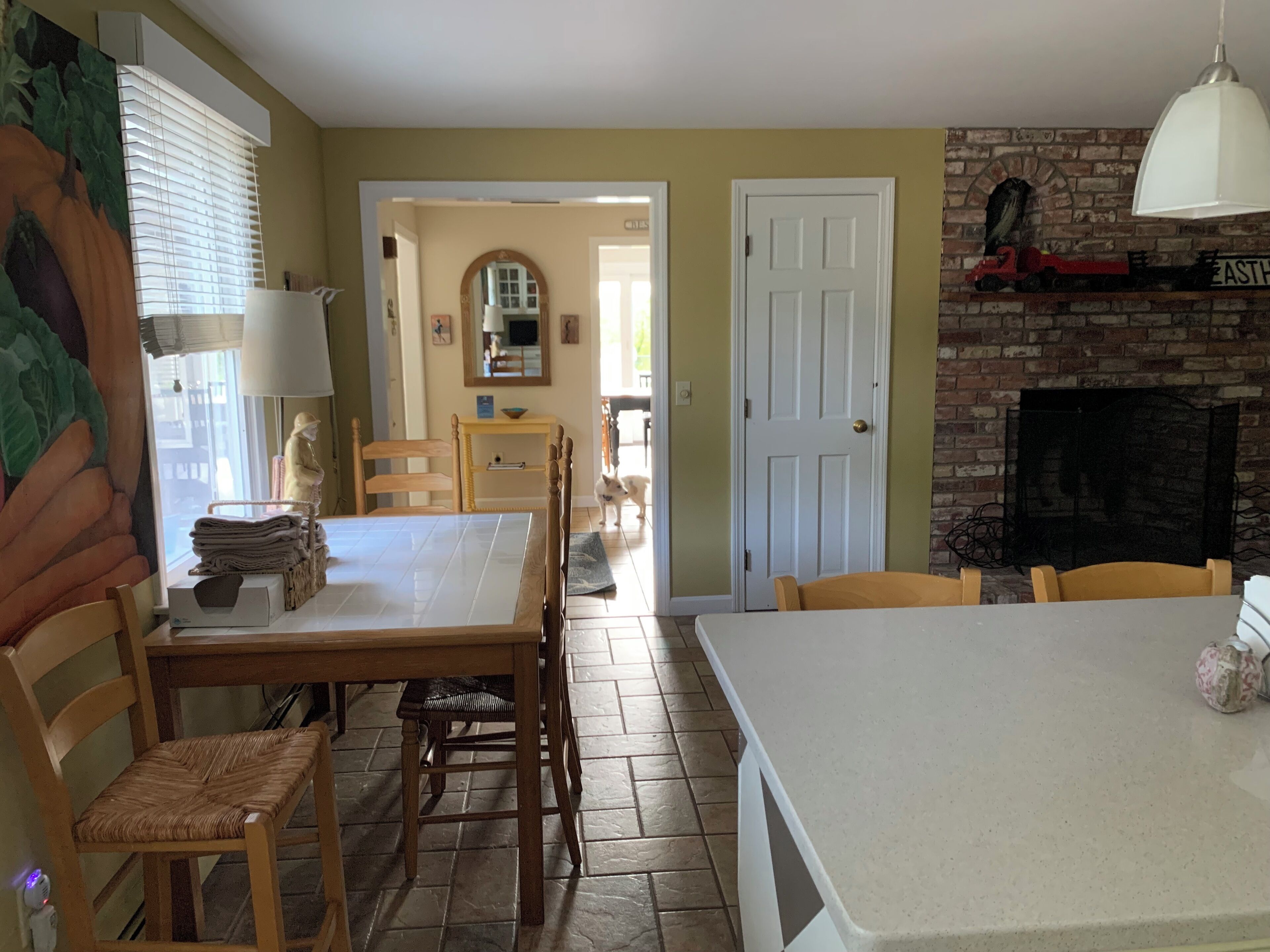 Kitchen, looking into front entry hall