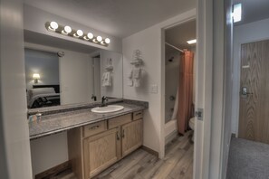 Combined shower/tub, hair dryer, towels, soap