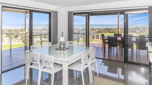 Enjoy dining or socializing with a scenic view from the expansive deck.