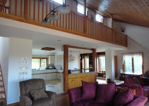 Smart TV, fireplace, table football, books