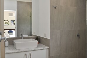 Bathtub, hair dryer, towels, soap