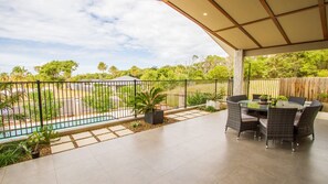 Outdoor dining - REFLECTIONS Agnes Water - pet friendly with pool (Agnes Water)